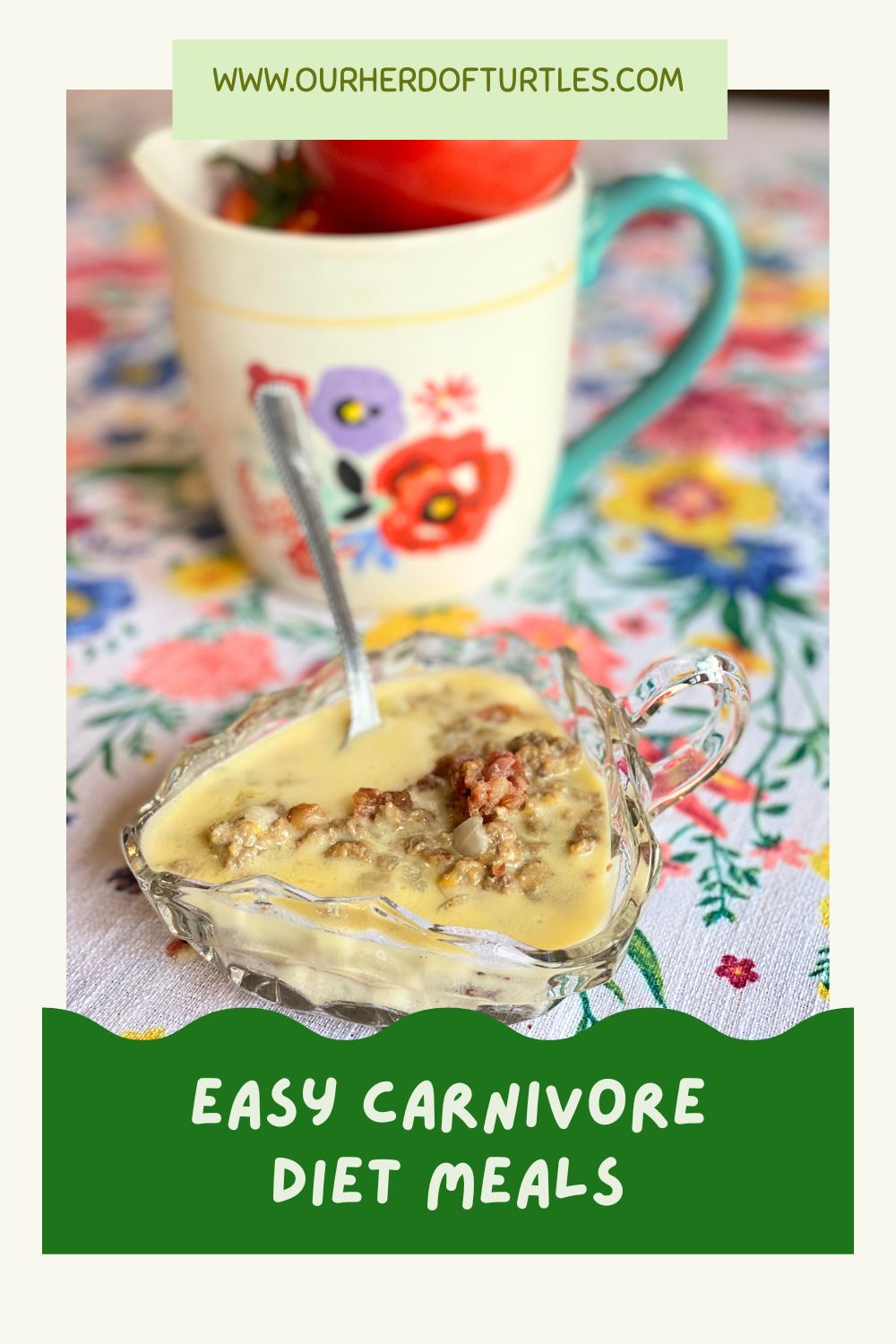 glass bowl of cheeseburger soup on a table with a metal spoon