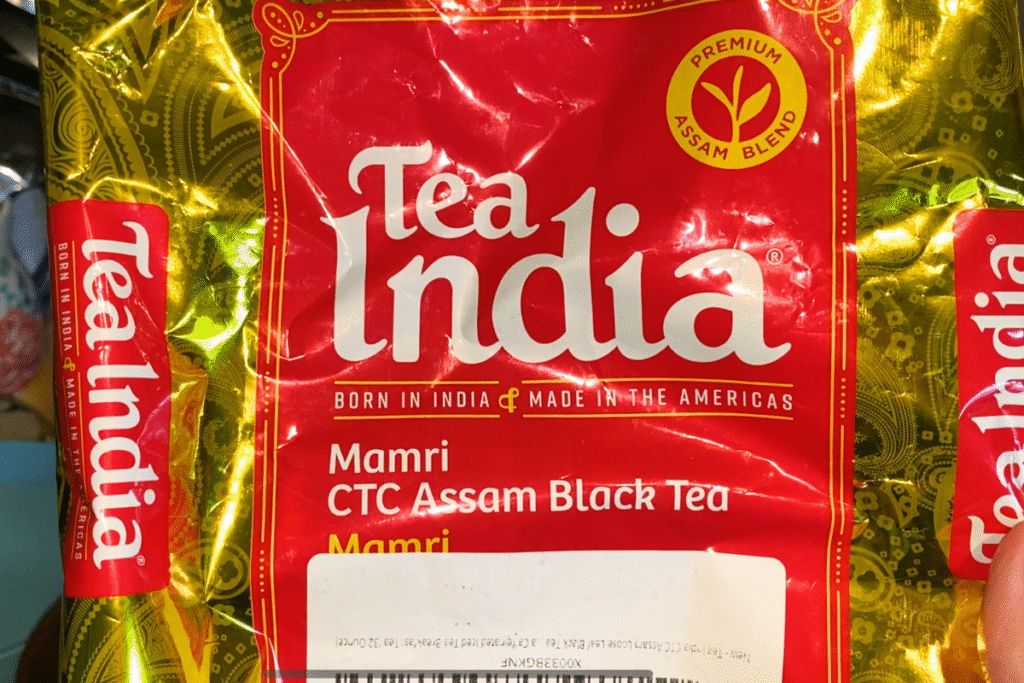 gold and red bag with a label that reads Tea India