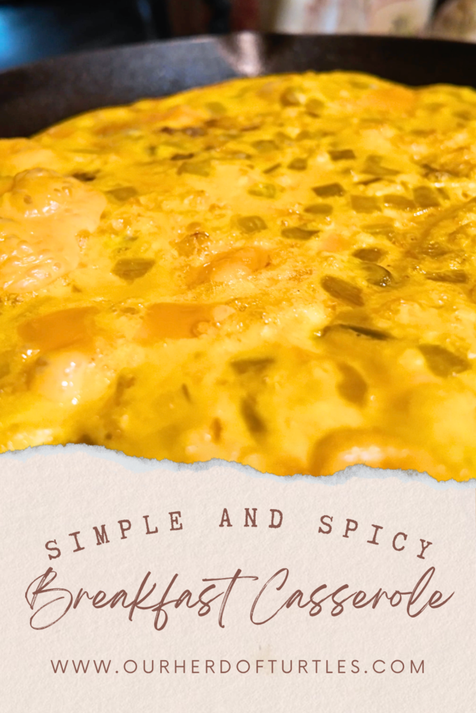 close up of sausage egg and cheese casserole in cast iron skillet